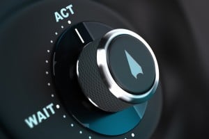 mechanical-dial-pointing-from-wait-to-act