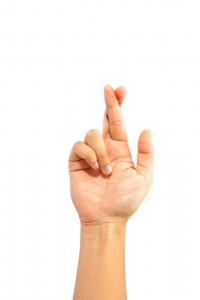 hand-crossing-fingers-hopeful