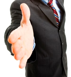 business-man-offering-handshake